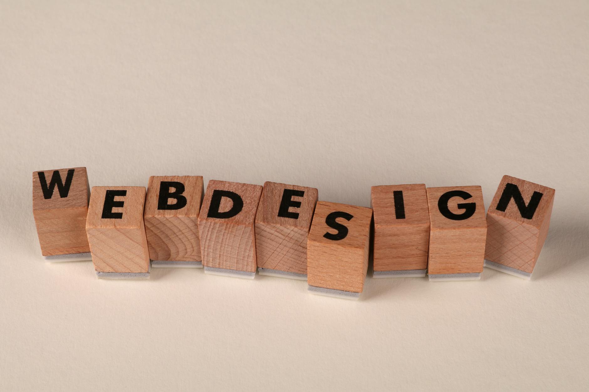 Creative wooden blocks displaying 'web design' concept for Brisbane's top digital design agencies in 2026