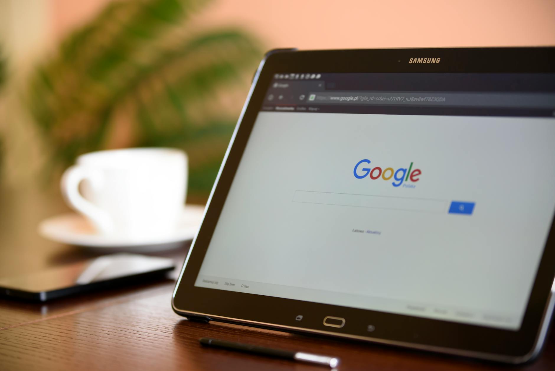 Small business owner using tablet to request customer reviews on Google