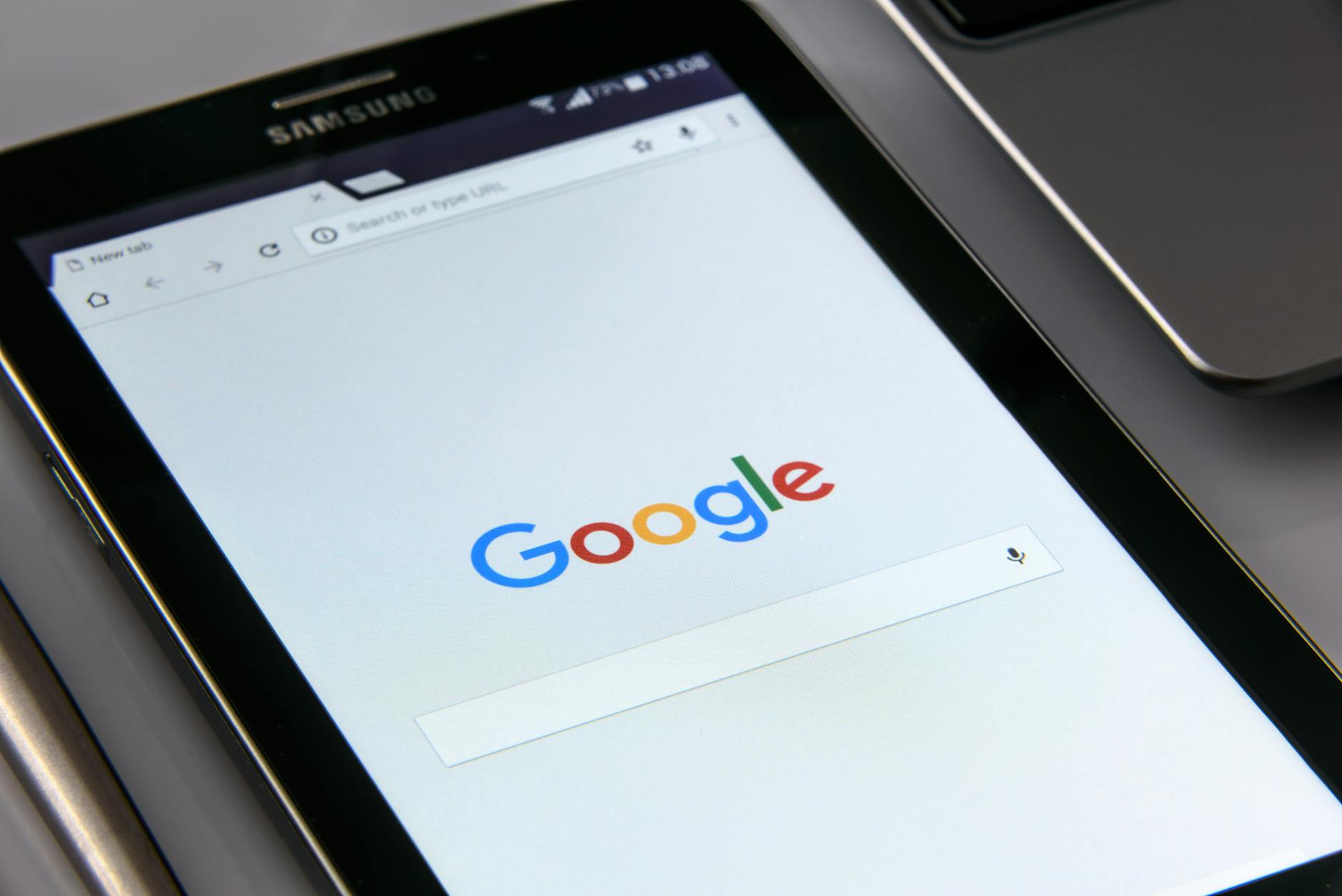 Small Australian business owner checking Google reviews on tablet to boost online reputation