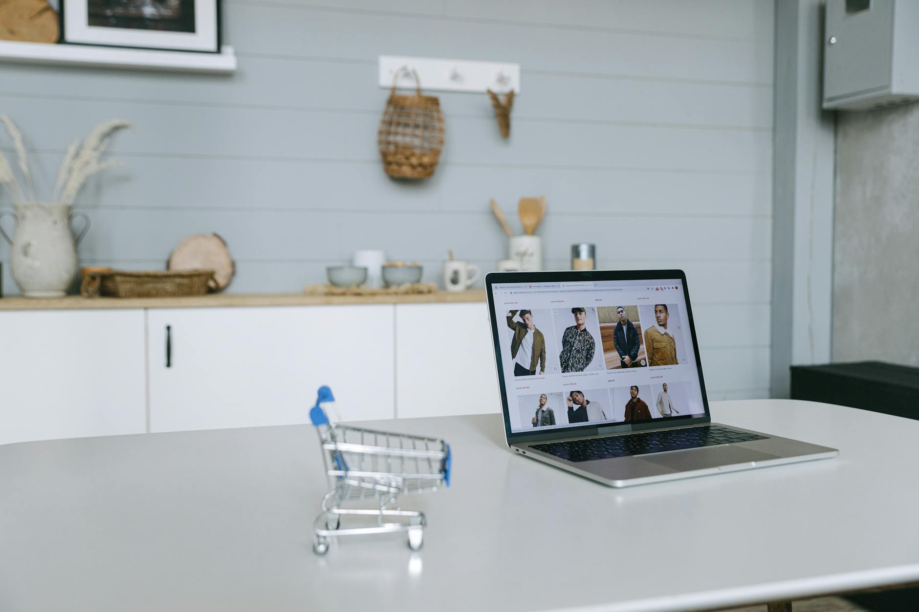 Small business website builder interface displaying React and WordPress comparison tools on laptop screen