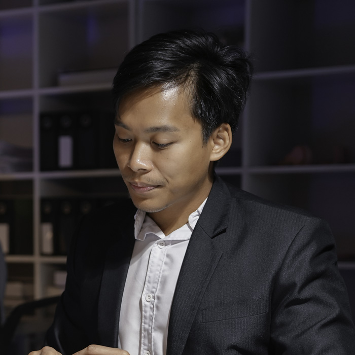 Boutique owner smiling representing success with social media management services